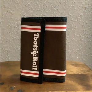 Tootsie Roll they see me Rollin wallet